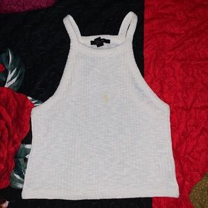 A cute white top worn once and it is see though